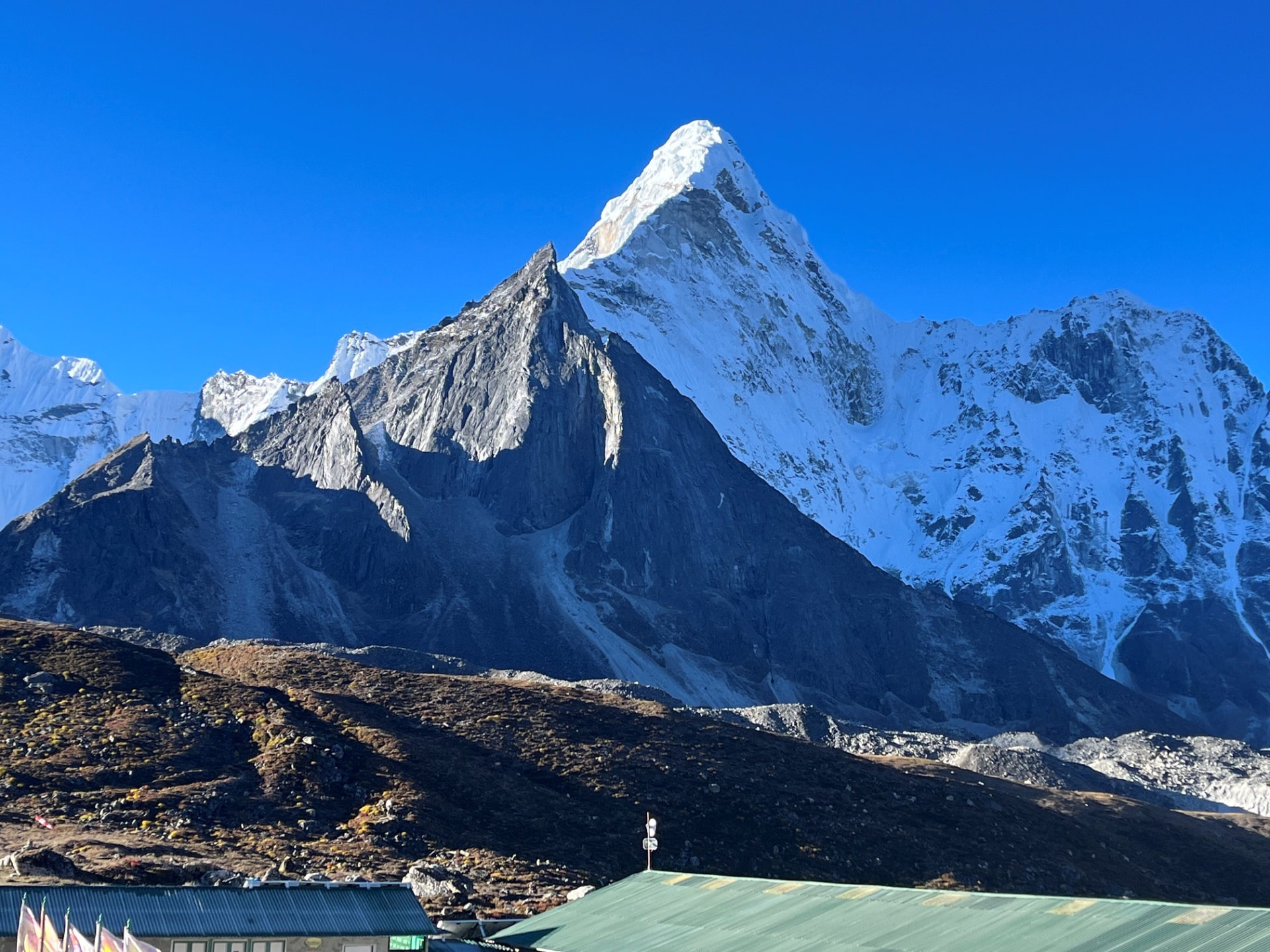 Snow-capped Himalayan peak under a clear blue sky